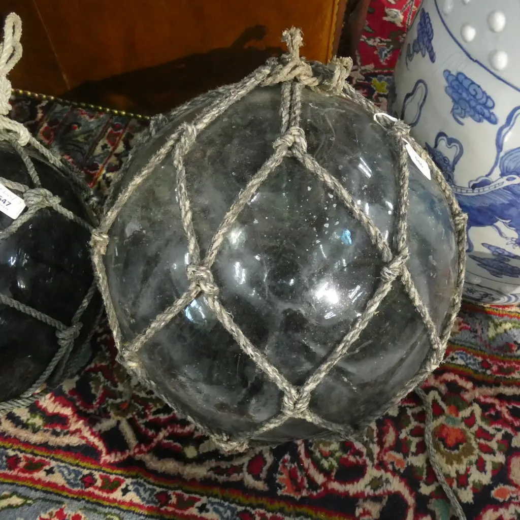 OLD GLASS LARGE FISHING FLOAT WITH BLACK NETTING 360mm dia Image 1++