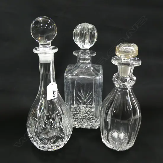 3 CRYSTAL DECANTERS WITH STOPPERS - TALLEST H. 270MM