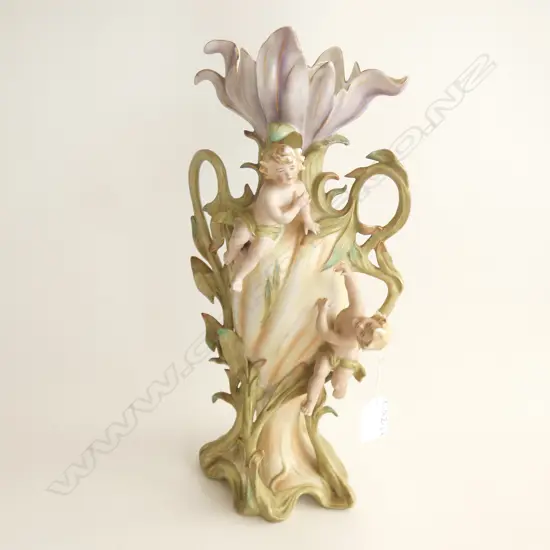 ANTIQUE PORCELAIN BISQUE VASE - APPLIED CHERUBS & LEAF TENDRILS H. 330MM (ONE FINGER A/F)