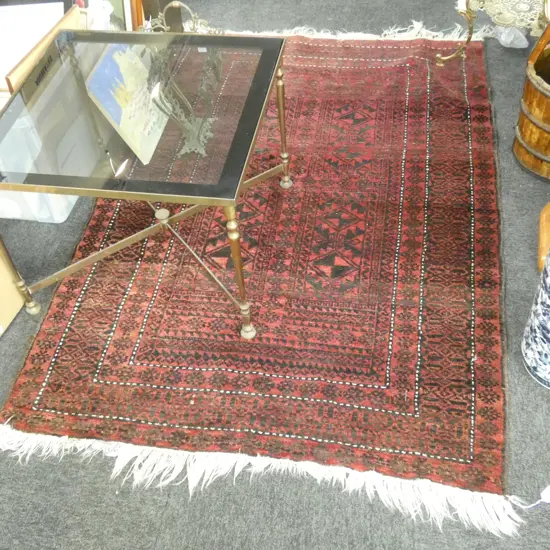 HAND KNOTTED ALL WOOL RUG...