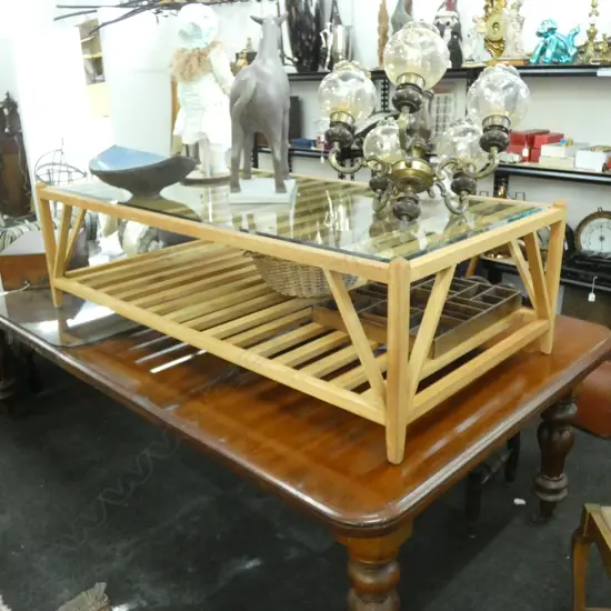 CONTEMPORARY PALE WOOD GLASS TOPPED COFFEE TABLE...