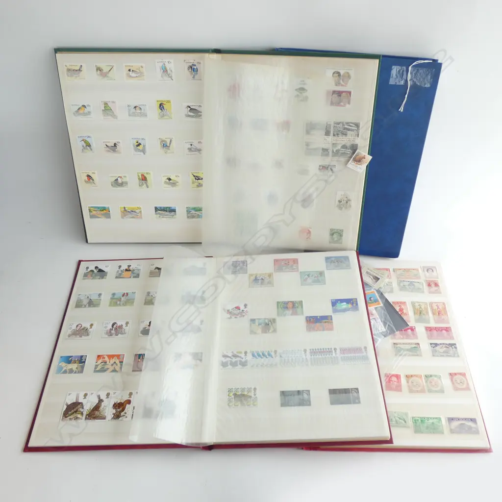 4 STAMP ALBUMS  Image 1++