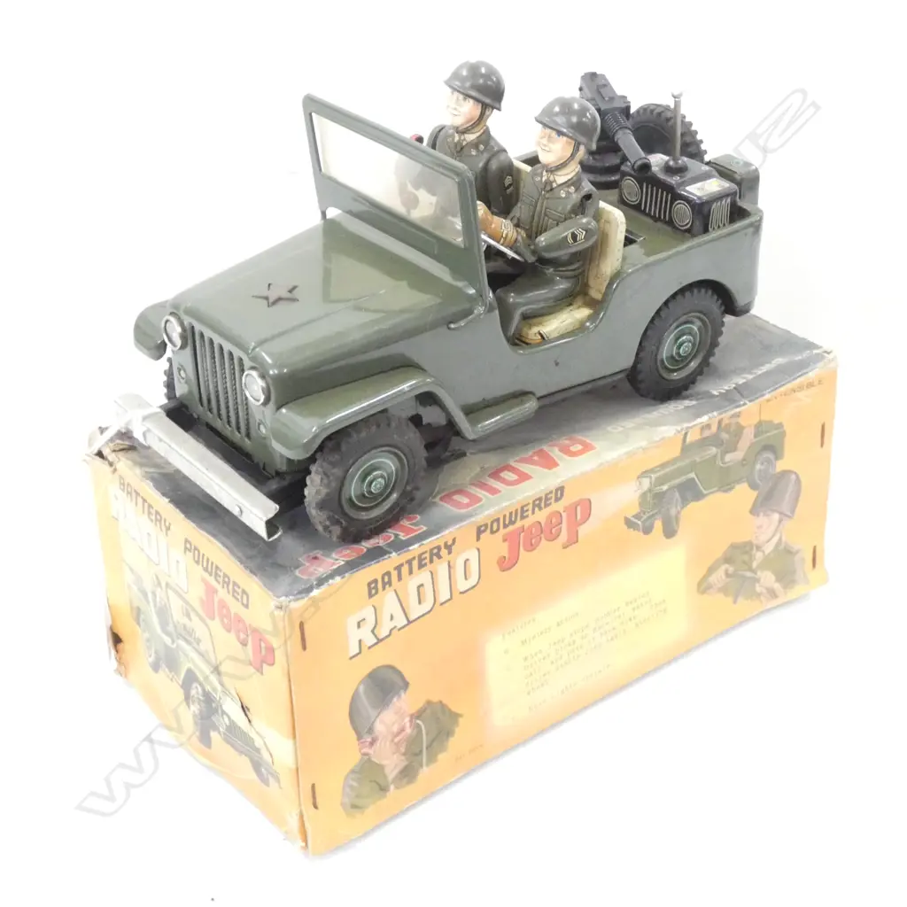 BOXED JAPANESE BATTERY POWERD RADIO JEEP WITH MYSERY ACTION BOX A/F SOME RUST TO JEEP L 280 MM Image 1++