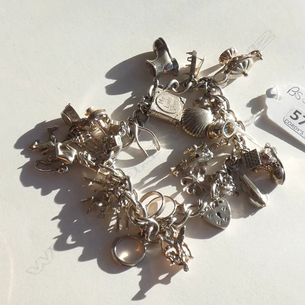 SILVER CHARM BRACELET Image 1++