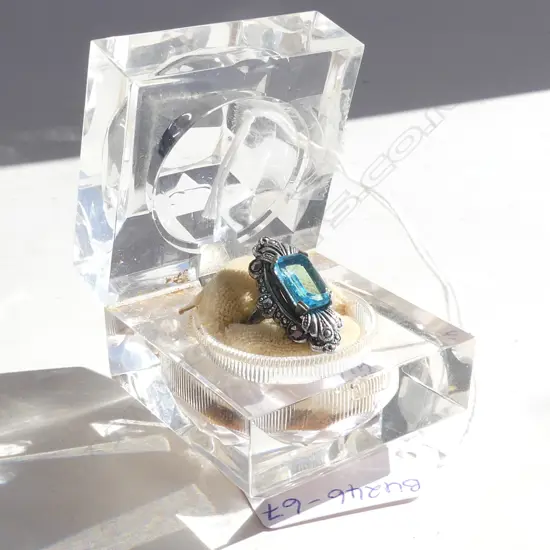 VINTAGE RING WITH BLUE STONE IN MARCASITE SETTING - IN CUT PLASTIC BOX
