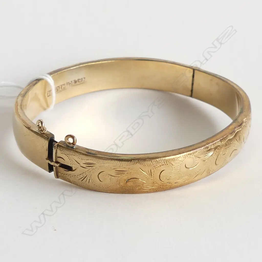 (76) ROLLED GOLD HINGED BANGLE Image 1++