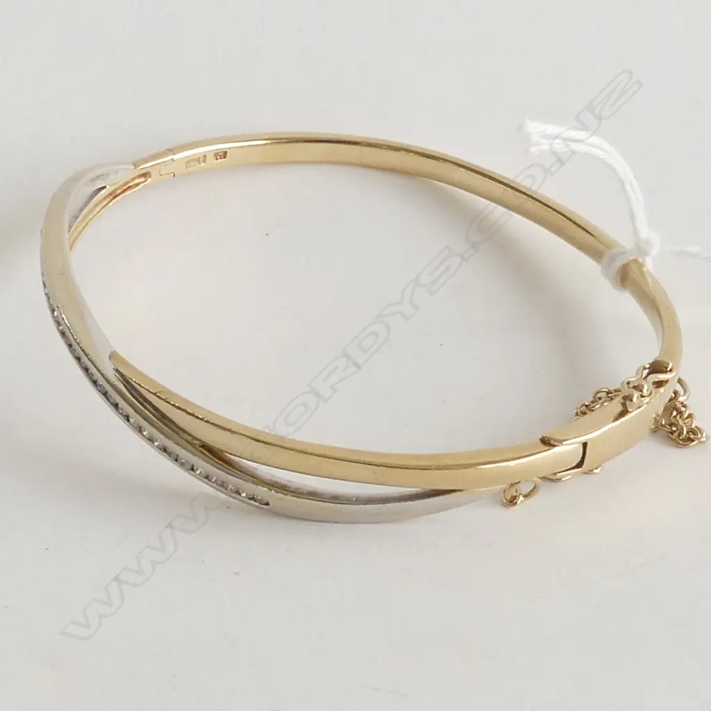(82) 9CT GOLD Mjh DIAMOND SET BANGLE 0.40ct 15.1gm Image 1++