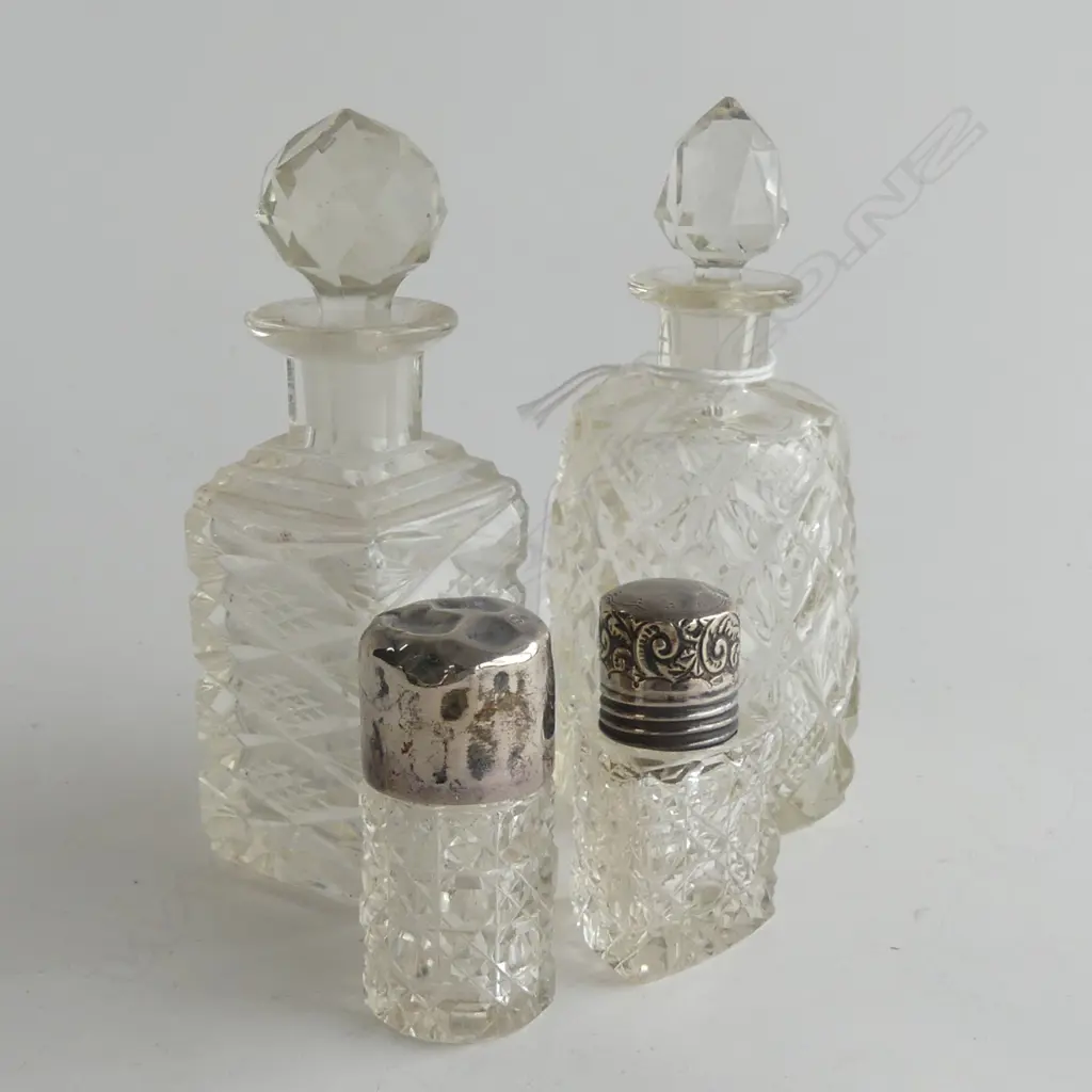 4 VINTAGE CUT GLASS SCENT BOTTLES; 2 WITH STG LID & 2 WITH GLASS STOPPERS - LARGEST H 130MM Image 1++
