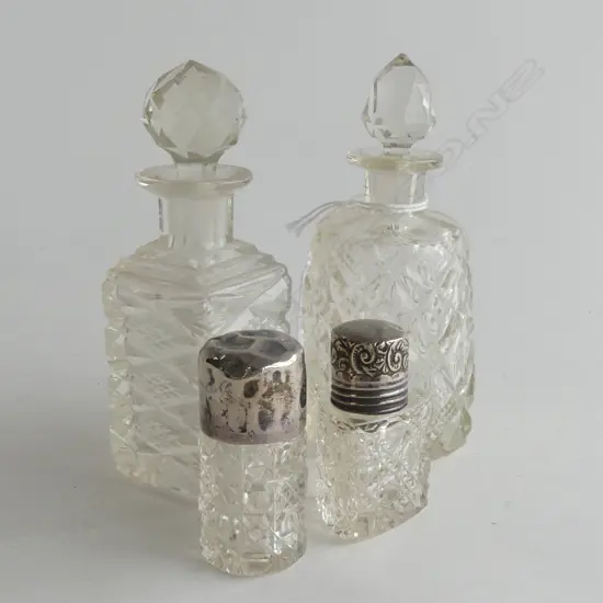 4 VINTAGE CUT GLASS SCENT BOTTLES; 2 WITH STG LID & 2 WITH GLASS STOPPERS - LARGEST H 130MM
