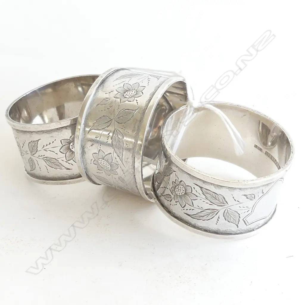 THREE SILVER NAPKIN RINGS 90gm Image 1++