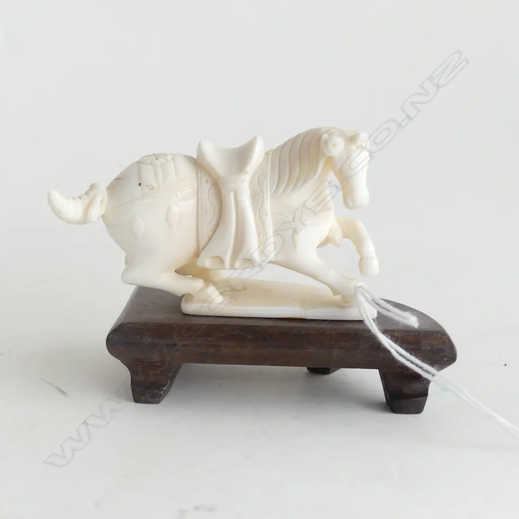 CARVED IVORY SITTING HORSE ON WOODEN STAND L 80MM Image 1++