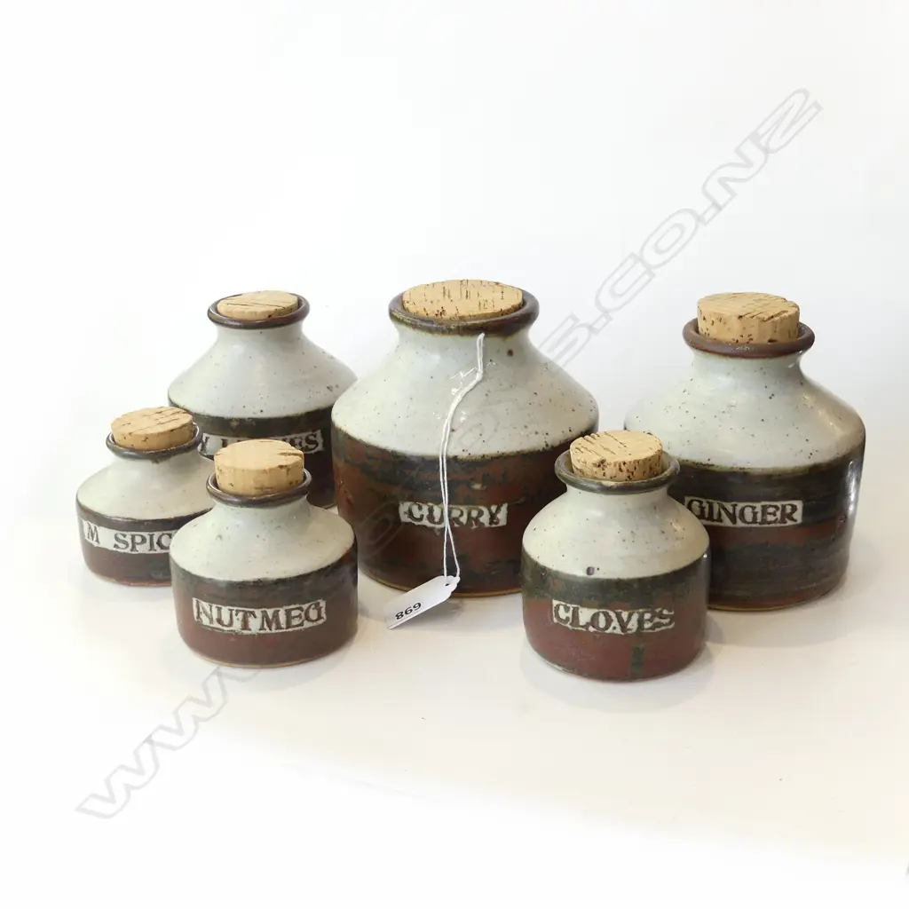 Spice pots - the two larger named 'Bay Leaves' and 'Ginger' three smaller (nutmeg /m spice / cloves) each with tenmoko glaze to the body Image 1++