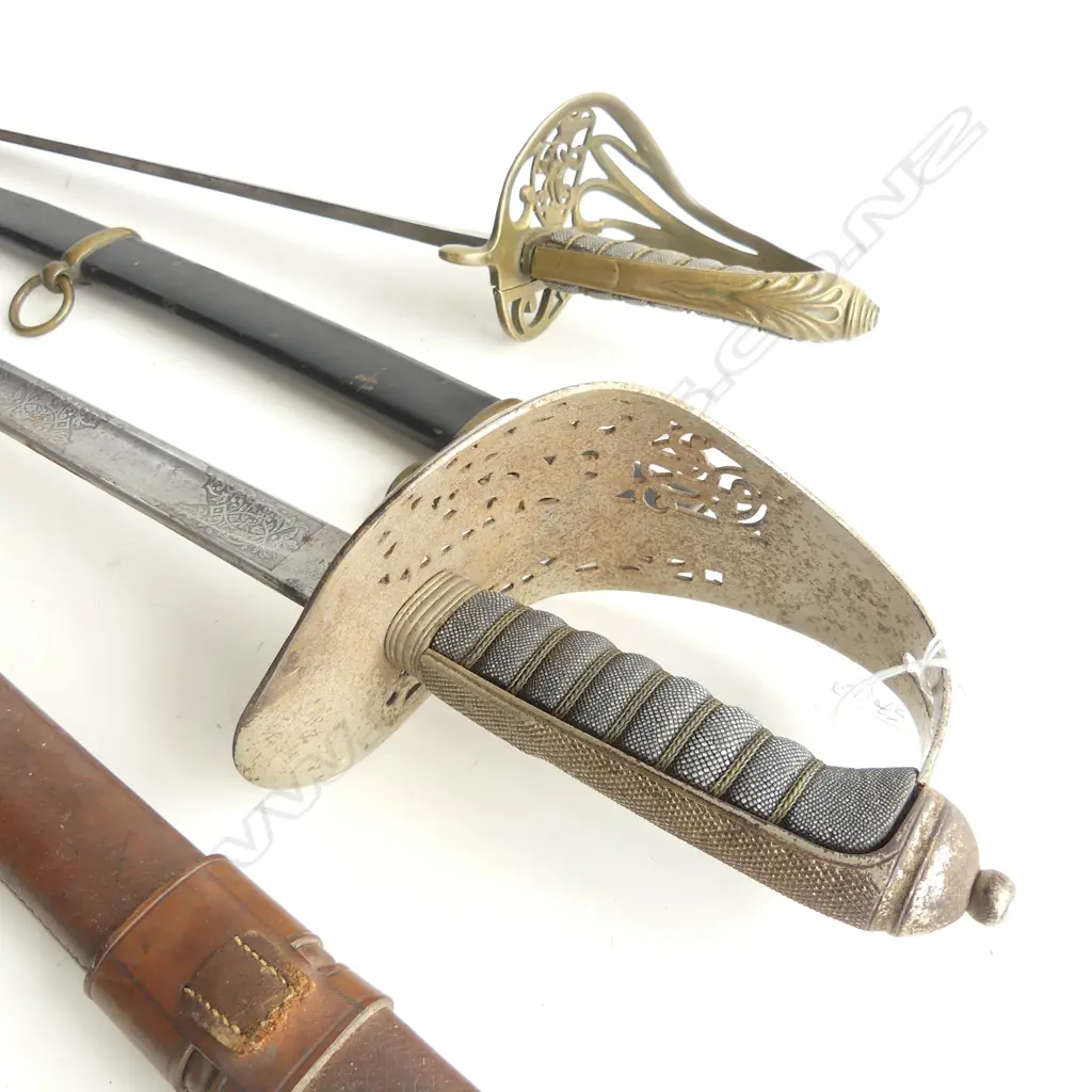 TWO BLADED WEAPONS ONE PARADE GROUND SWORD EDWARD VIIth PERIOD (SOME RUST) IN SCABBARD PLUS MIDDLE EASTERN SABRE ALSO Image 1++