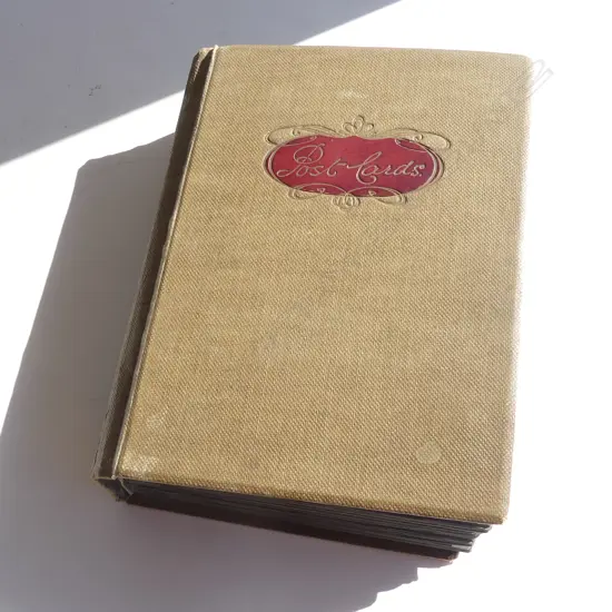 LARGE COLLECTION OF OLD POSTCARDS IN ALBUM FROM AROUND THE WORLD