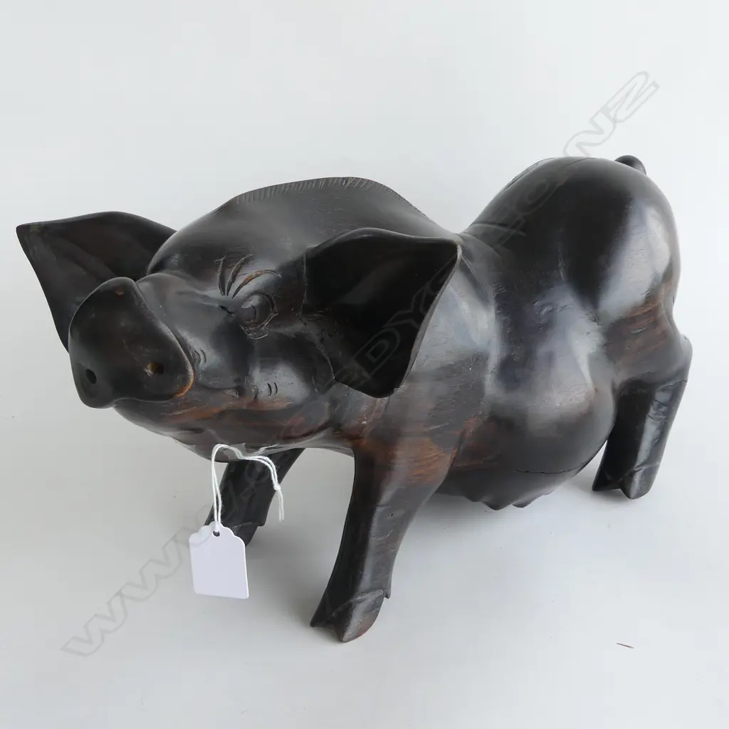 CARVED EBONY PIG ORNAMENT - HEAVY Image 1++