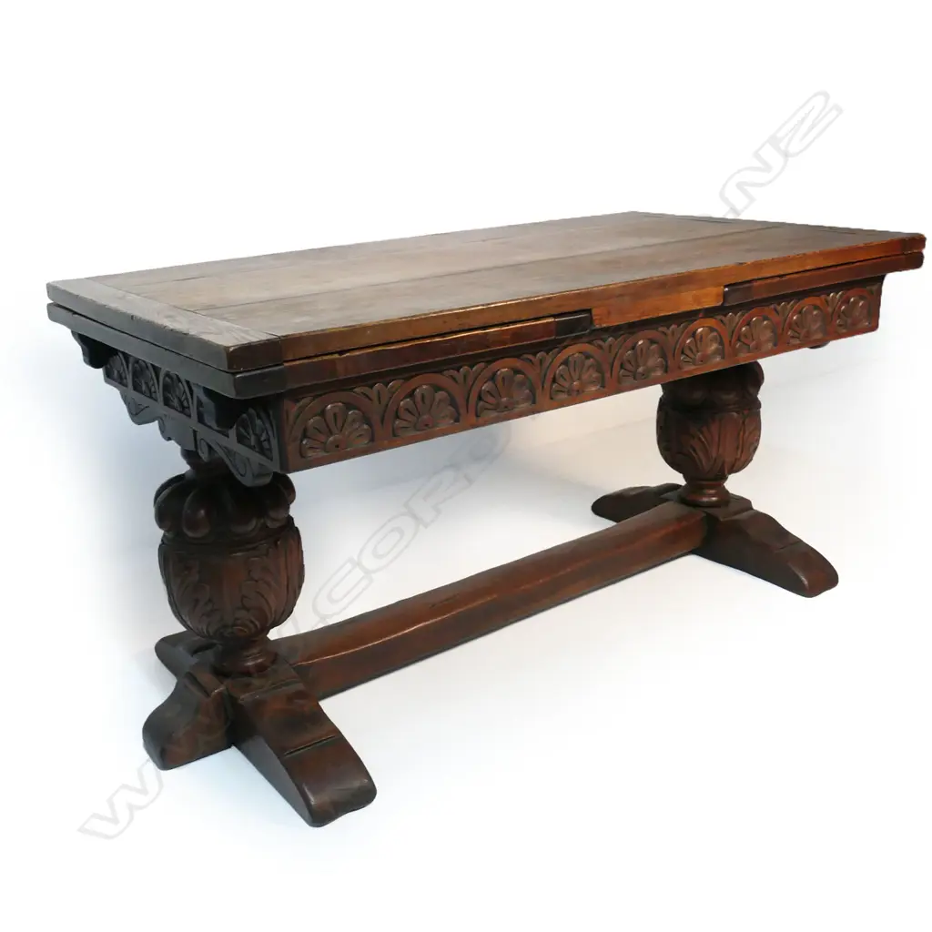A Victorian oak Elizabethan style refectory draw leaf dining table Image 1++