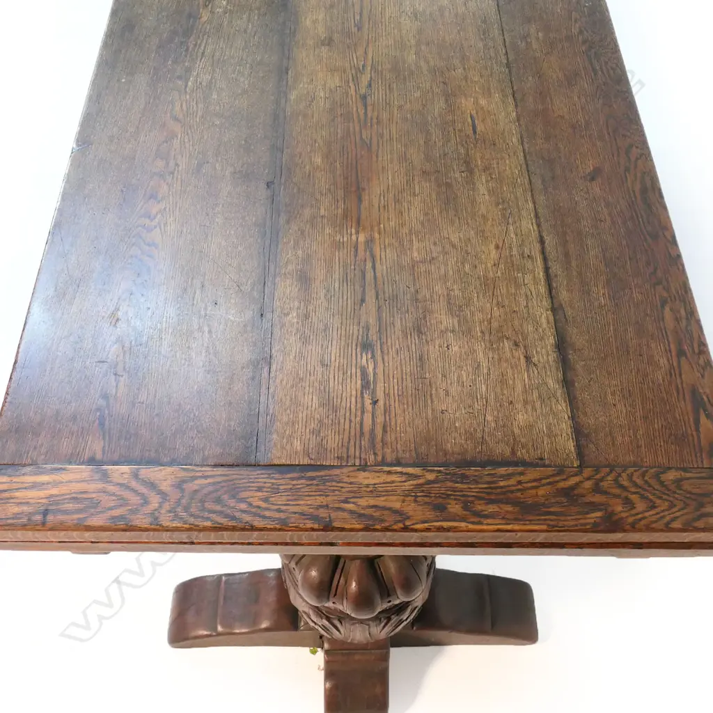 A Victorian oak Elizabethan style refectory draw leaf dining table Image 1++