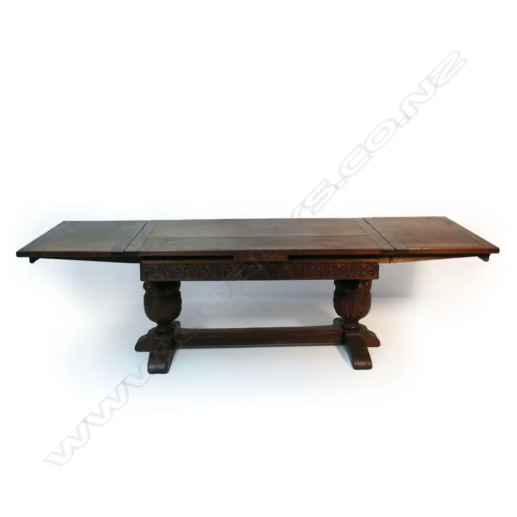 A Victorian oak Elizabethan style refectory draw leaf dining table Image 1++
