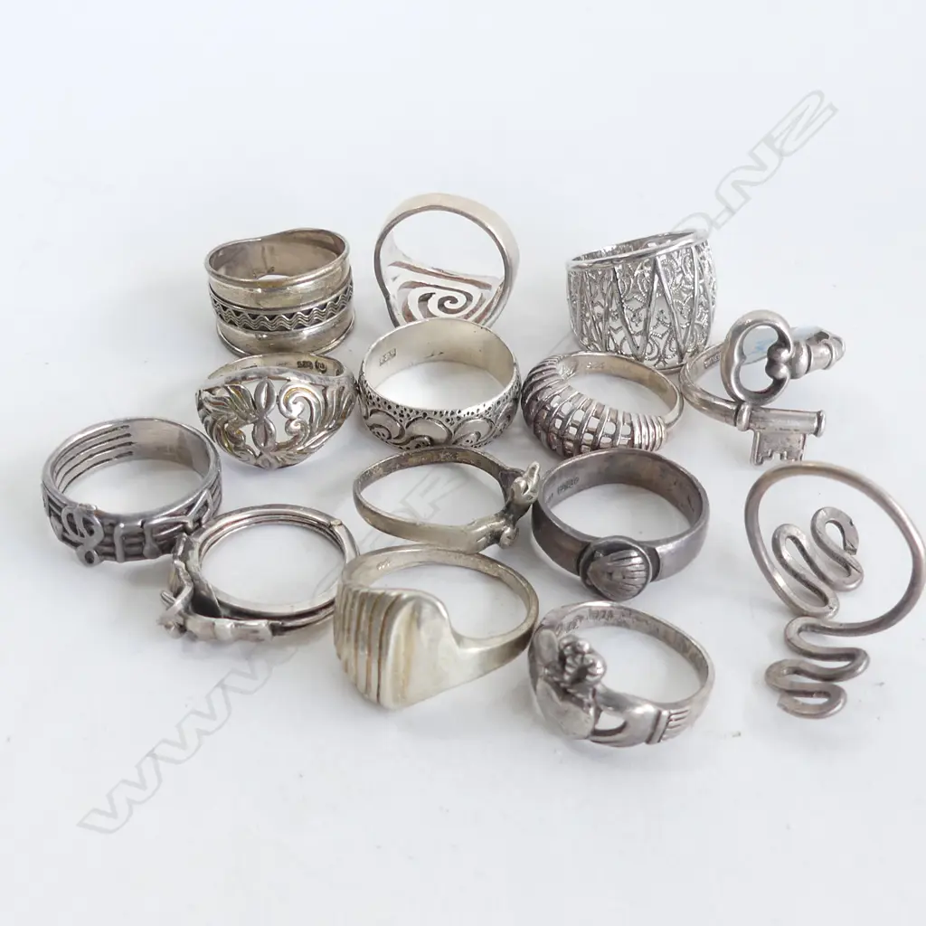 14 ASST. STG RINGS 48 GRAMS Image 1++
