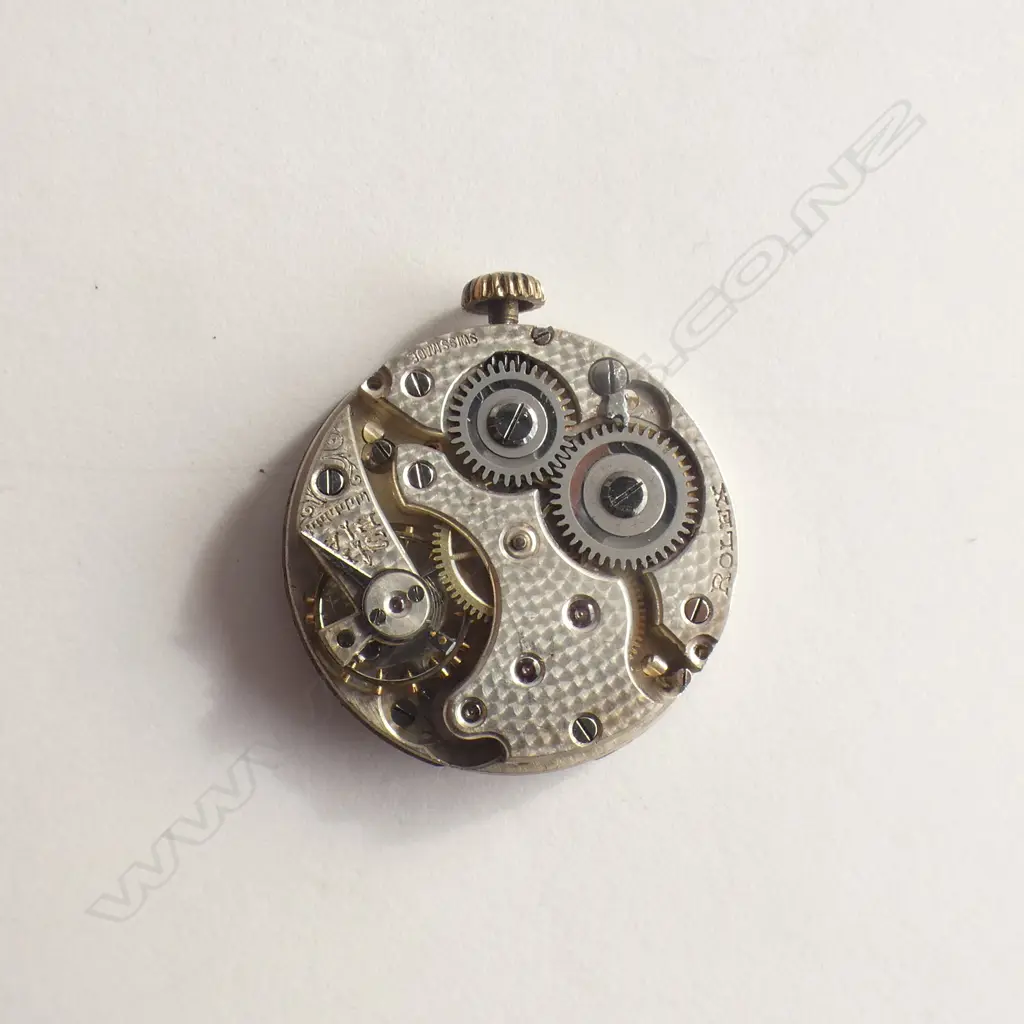 ROLEX VINTAGE WATCH MOVEMENT NAMED TO THE BACK Image 1++