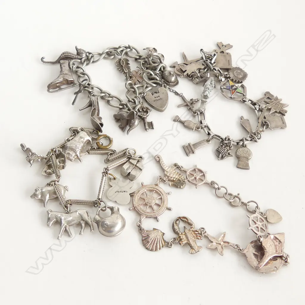 4 STG CHARM BRACELETS 81 GRAMS Image 1++