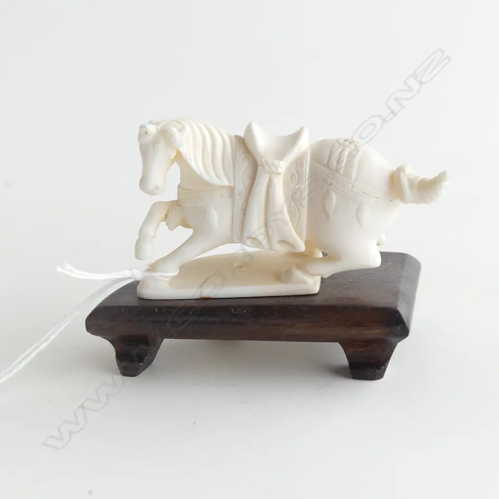 CARVED IVORY SITTING HORSE ON WOODEN STAND L 80MM Image 1++
