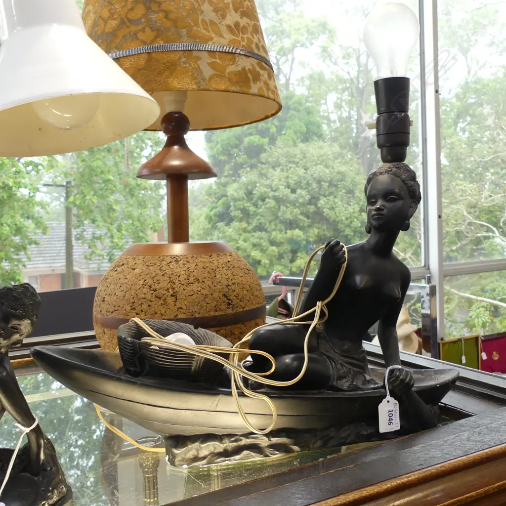LG TABLE LAMP - NAKED BLACK LADY IN RAFT - MISSING OAR & DAMAGE TO END OF RAFT L 500MM Image 1++
