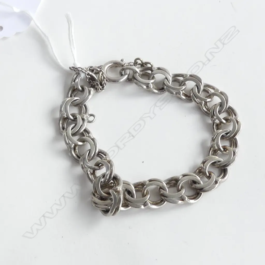 SILVER BRACELET W DBLE RING LINKS Image 1++