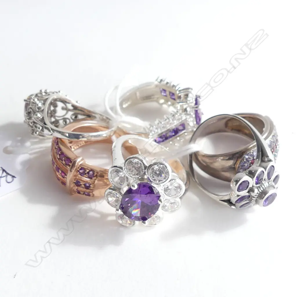 6 STG & PURPLE STONE RINGS 27 GRAMS Image 1++