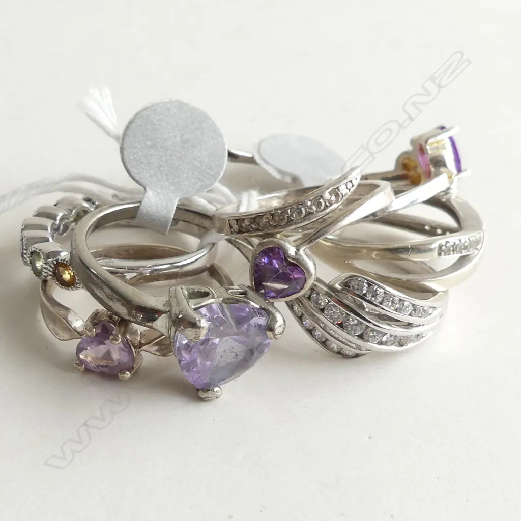 8 STG & PURPLE STONE RINGS 23 GRAMS Image 1++