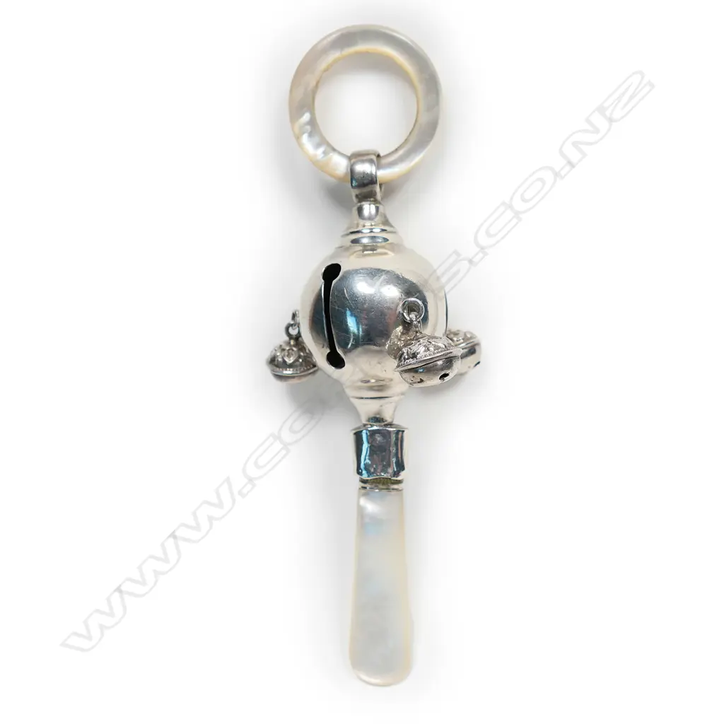 An early 1900s silver and mother of pearl baby rattle, Image 1++