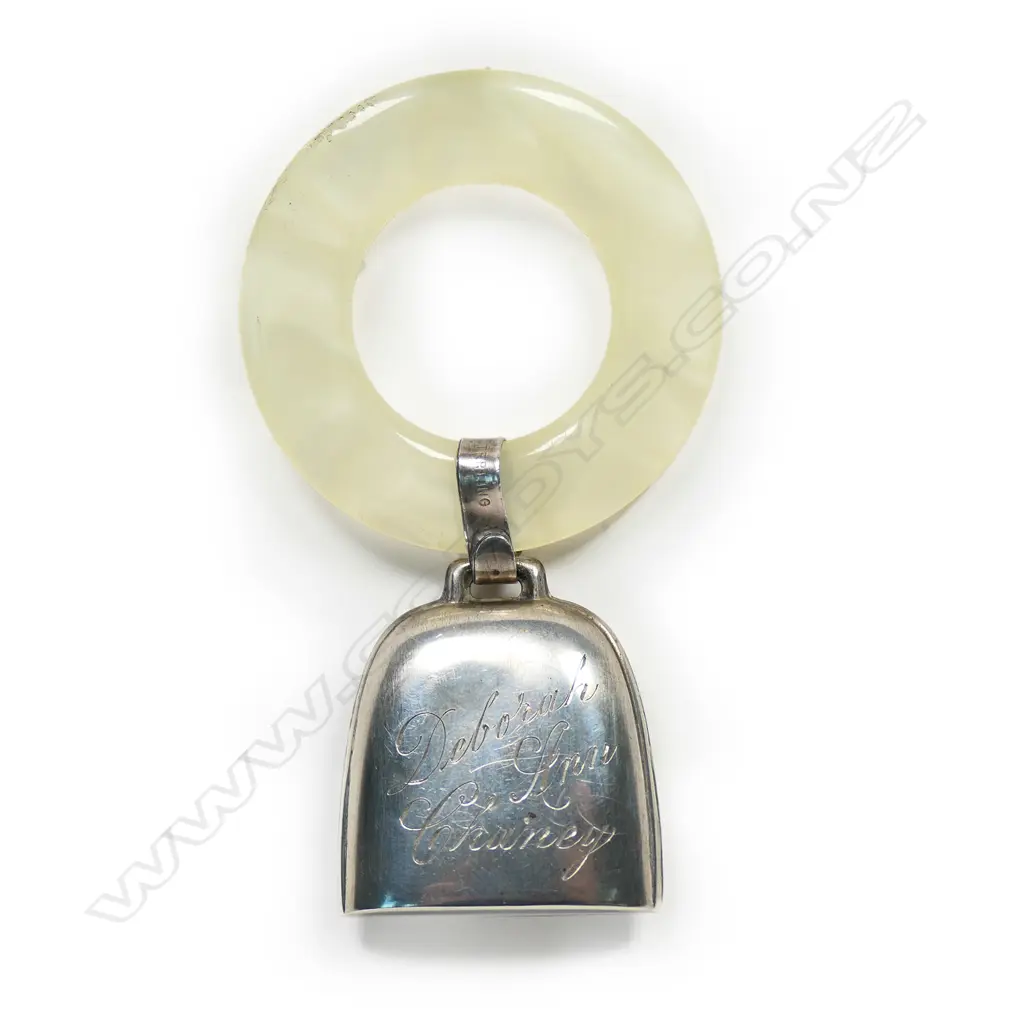 A mid 20thC silver and simulated mother of pearl baby rattle, Image 1++