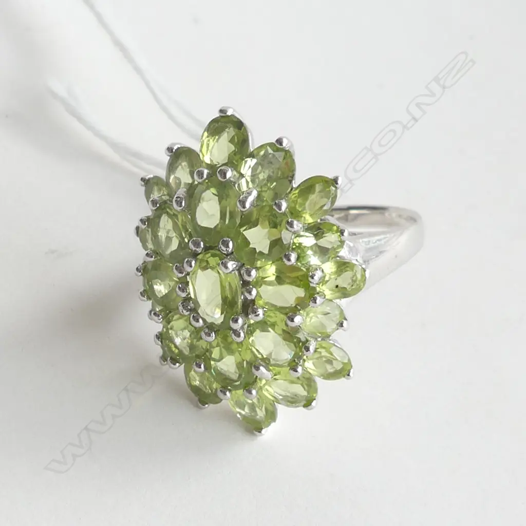 SILVER RING WITH MULTI PERIDOT STYLE STONES, SIZE O Image 1++