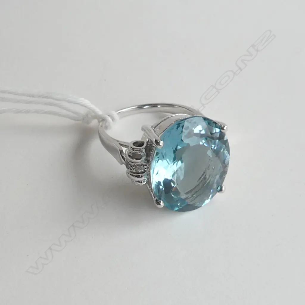 SILVER RING WITH TOPAZ STYLE STONE AND CZs, SIZE N Image 1++