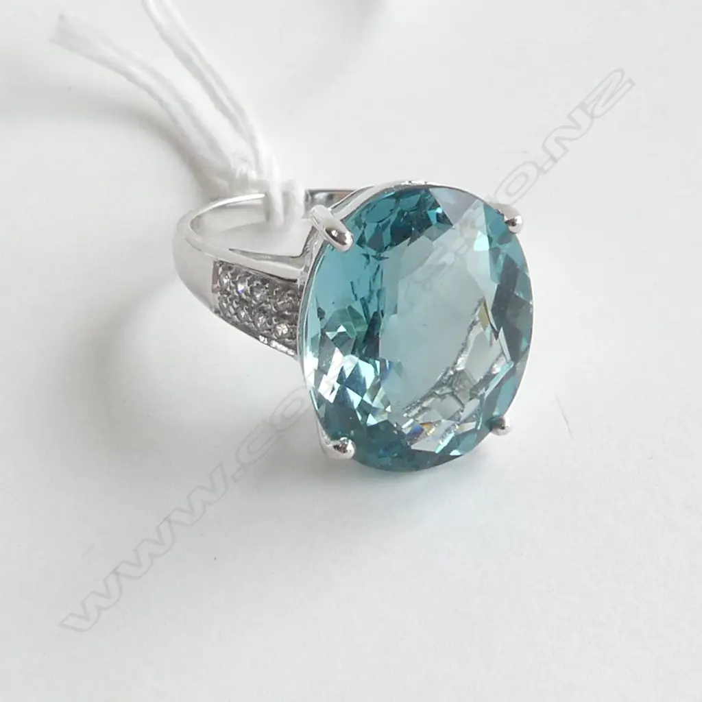 SILVER RING WITH TOPAZ STYLE STONE AND CZs, SIZE N Image 1++
