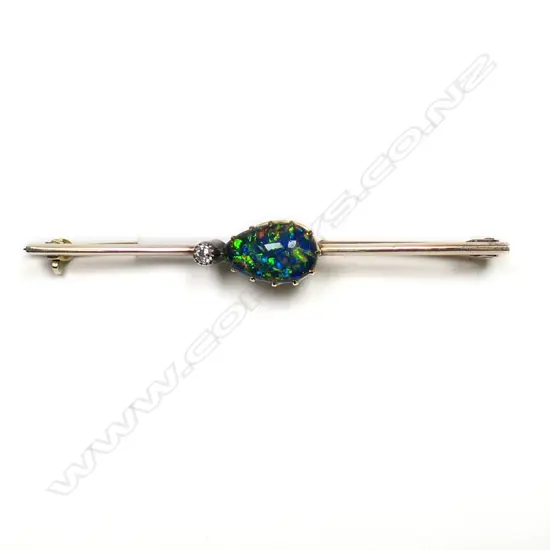 A c.1900 15ct yellow gold, black opal and diamond bar brooch,