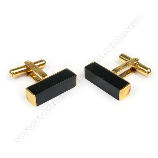A pair of 14ct gold cufflinks, each a rectangular bar of black onyx in gold frame,