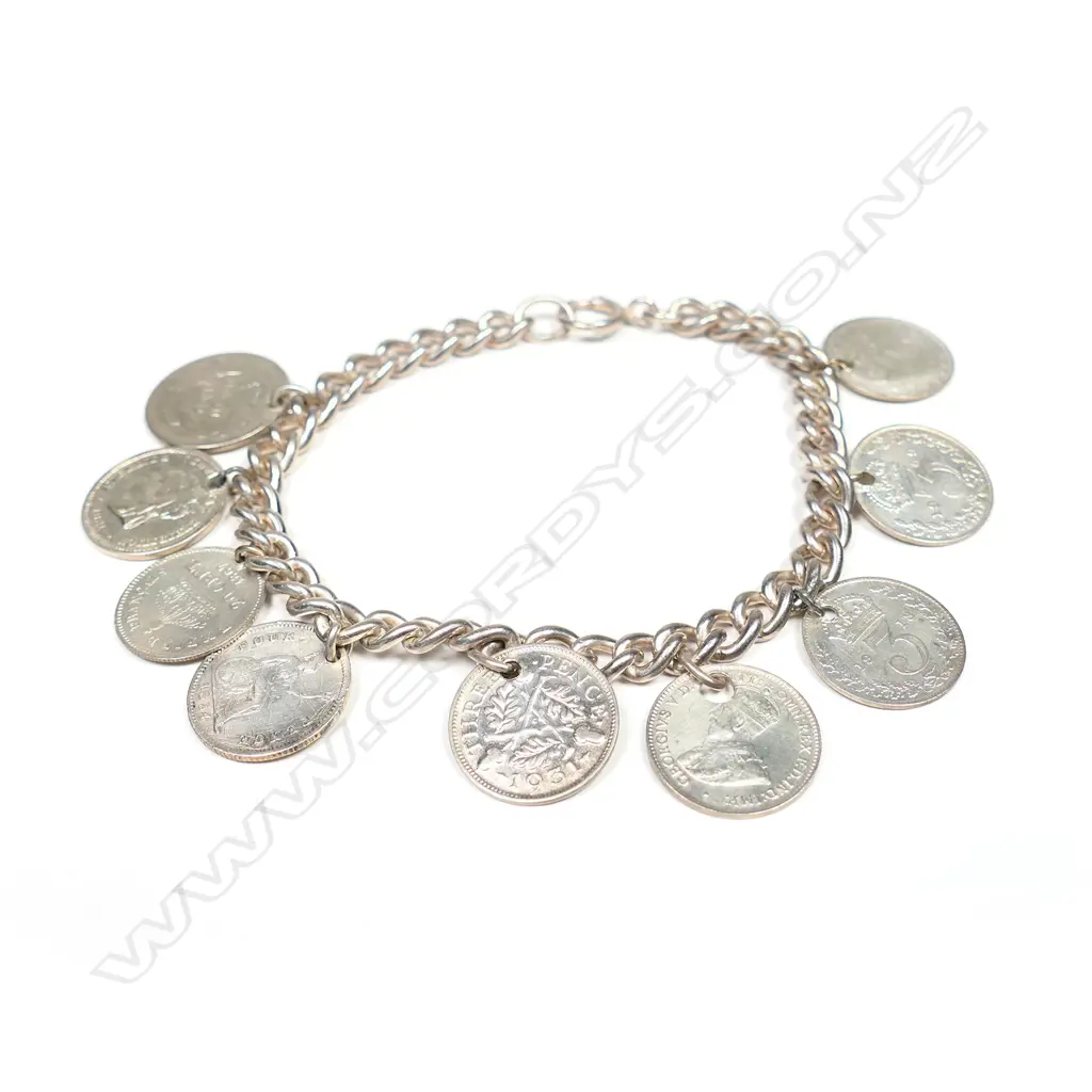 A vintage silver bracelet with silver coin charms, Image 1++