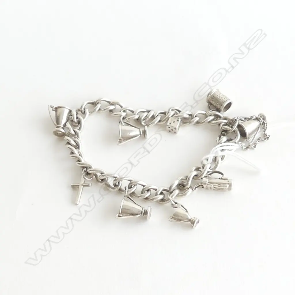 STERLING SILVER CHARM BRACELET WITH NINE CHARMS 45gm Image 1++