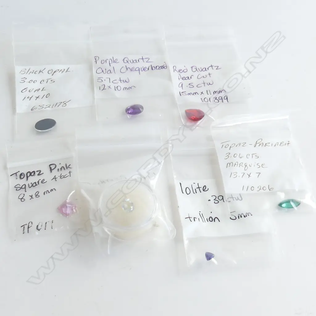 7 ASST STONES; PINK & PARIABA TOPAZ, PURPLE & RED QUARTZ, GREEN AMETHYST, OPAL, LOLITE Image 1++