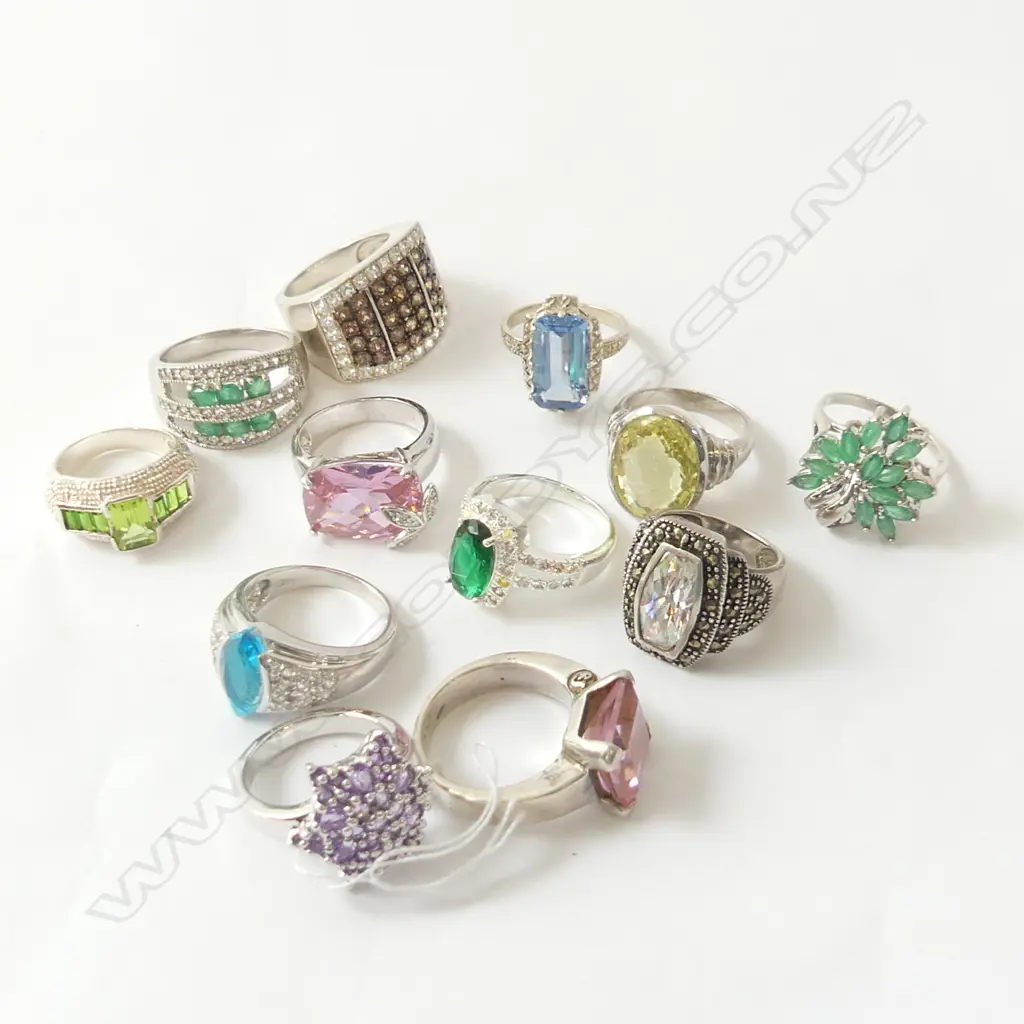 12 STG COSTUME RINGS 85gm. Image 1++