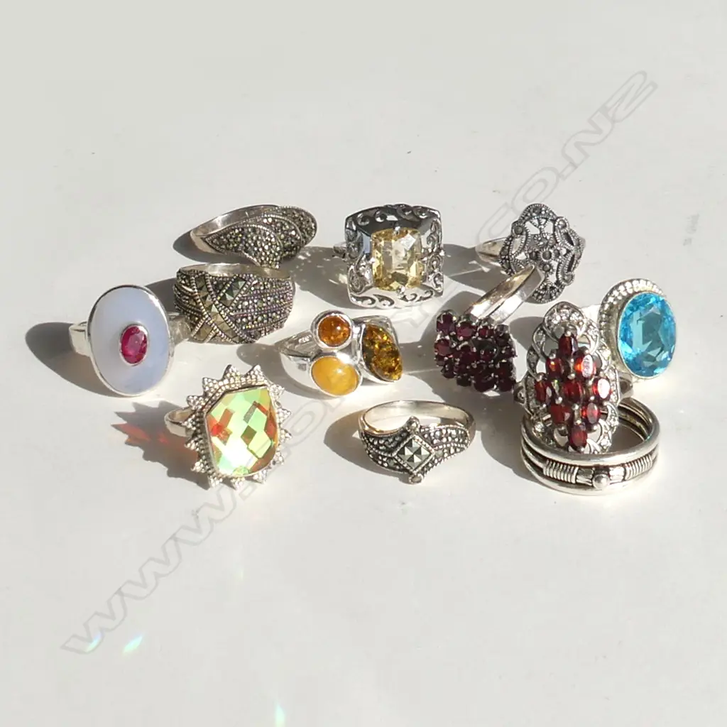 12 STG COSTUME RINGS 55gm. Image 1++