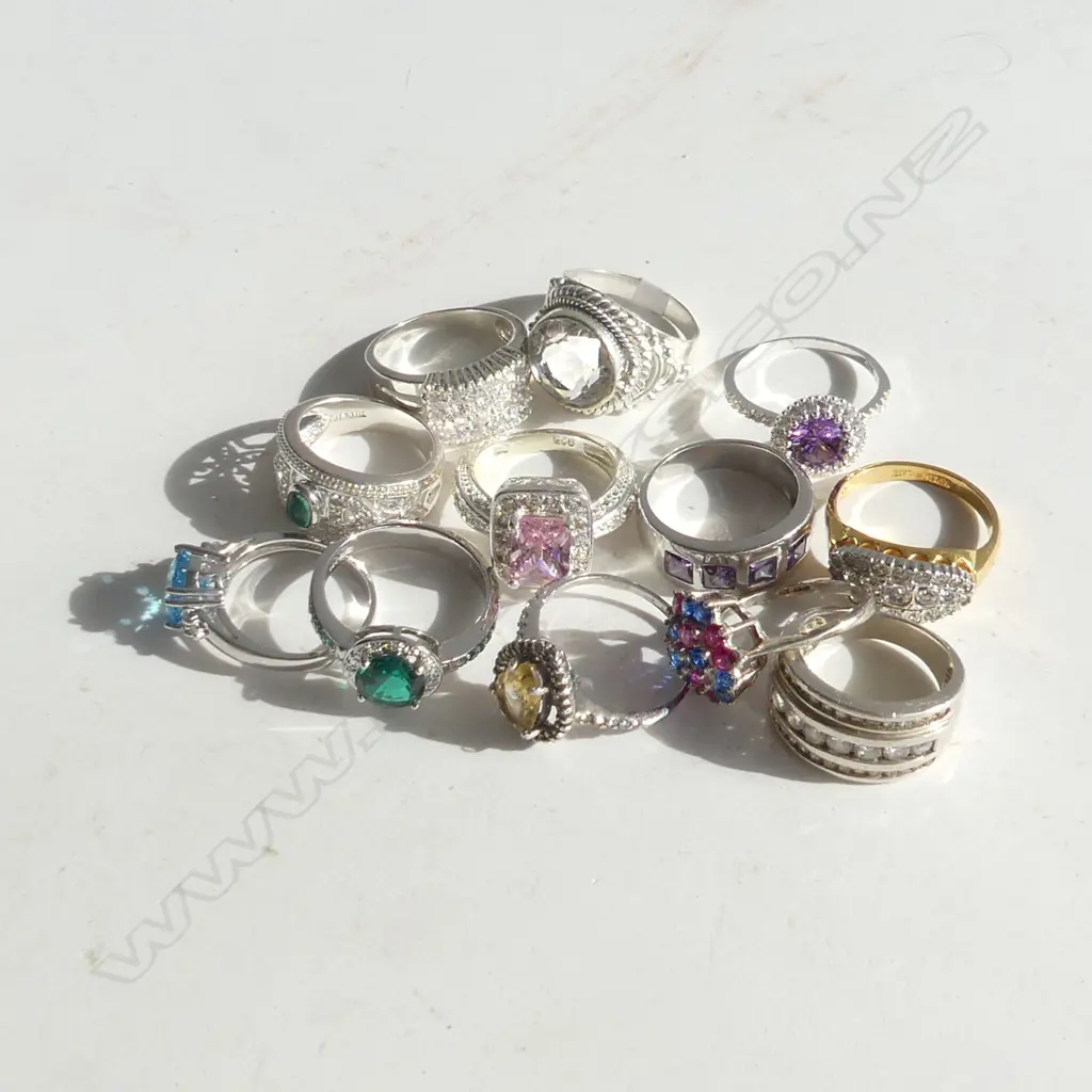 12 STG COSTUME RINGS 55gm. Image 1++