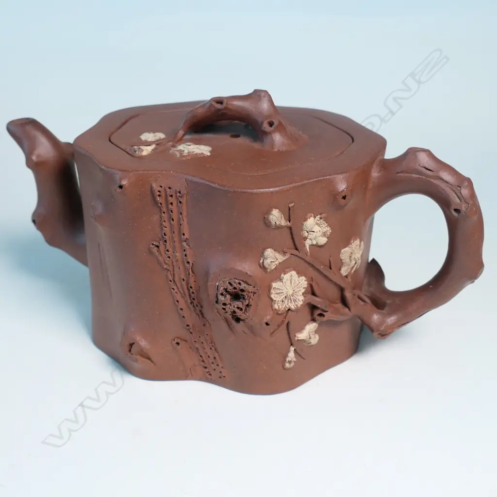 YIXING TEAPOT, MARKED 雲山吳製 (YUN SHANWU), NATURALISTICALLY MODELLED AS A CHERRY TREE TRUNK SECTION... Image 1++