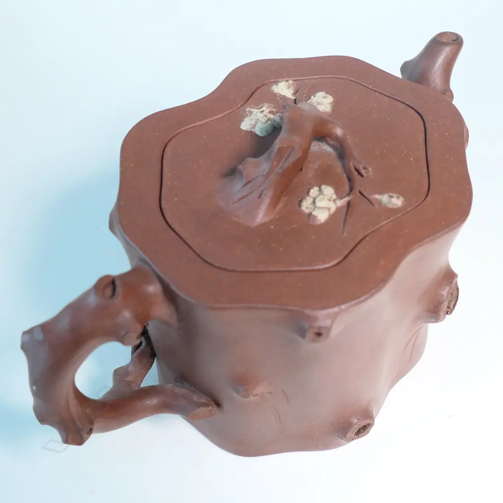 YIXING TEAPOT, MARKED 雲山吳製 (YUN SHANWU), NATURALISTICALLY MODELLED AS A CHERRY TREE TRUNK SECTION... Image 1++