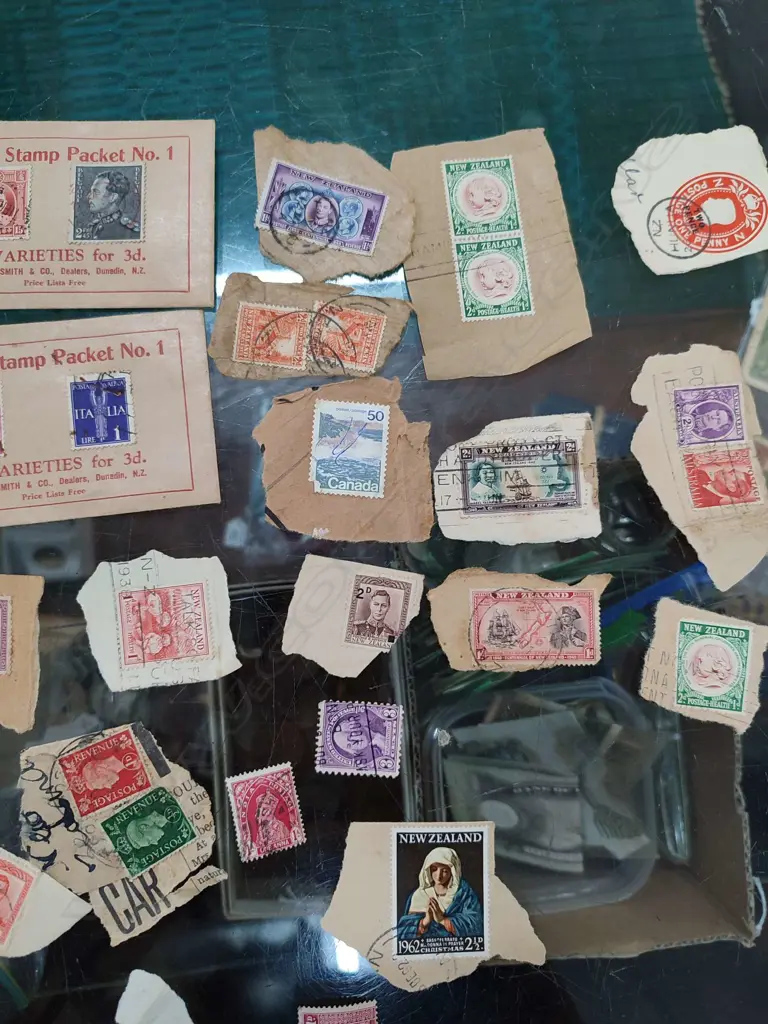 TIN OF ASST. VINTAGE STAMPS Image 1++