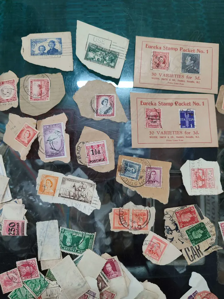 TIN OF ASST. VINTAGE STAMPS Image 1++