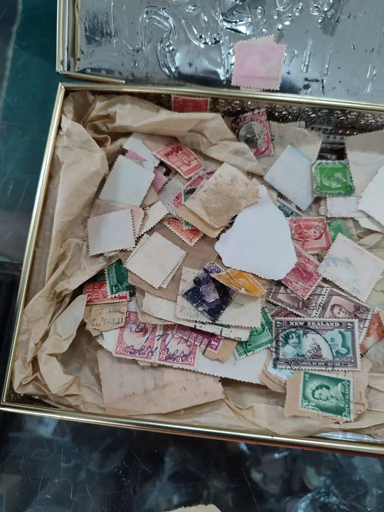 TIN OF ASST. VINTAGE STAMPS Image 1++