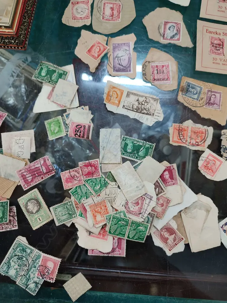TIN OF ASST. VINTAGE STAMPS Image 1++
