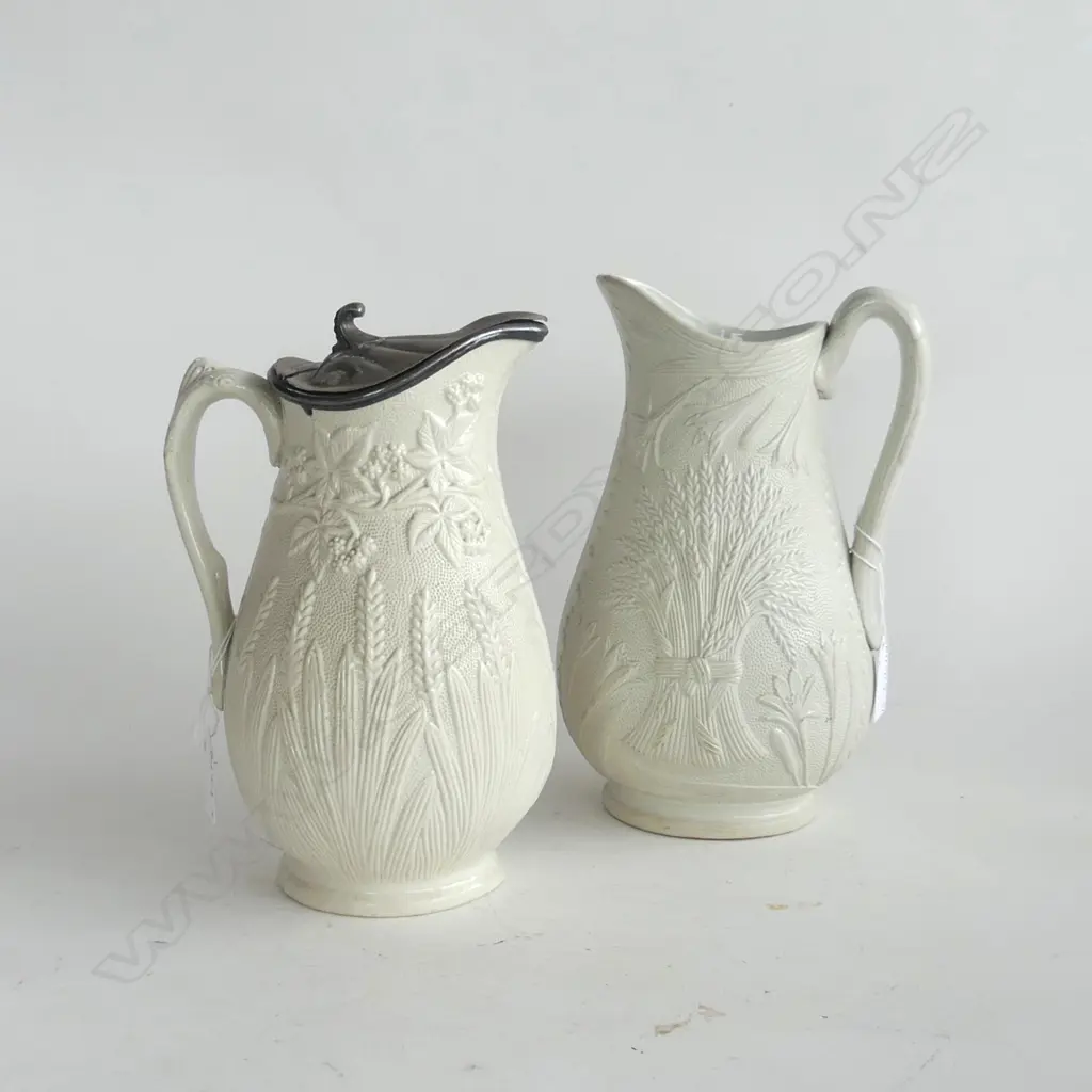 2 PARIAN WARE JUGS WITH WHEATSHEAF EMBOSSED DESIGNS, ONE HAS A PEWTER LID, (H.230 & 240mm) Image 1++